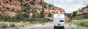 RV On A Trip Through Mountains