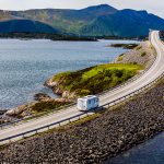 RV driving on road in mountains